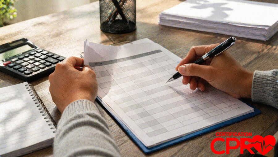 Person filling out a form for CPR certification in Orlando, Florida.